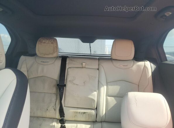 1GYFZFR41LF137789 2020 CADILLAC XT4 Silver Widok tylnych siedzeń