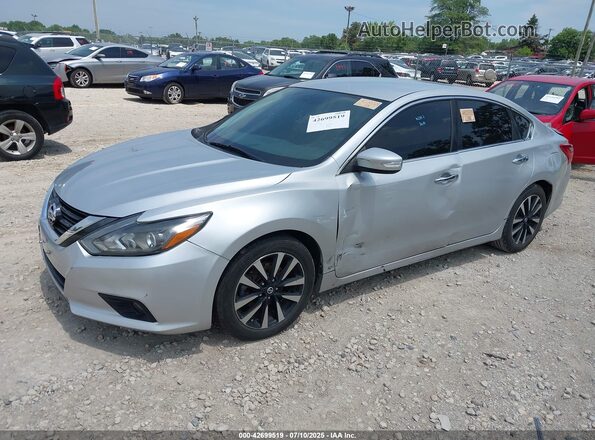 1N4AL3AP3JC198071 2018 NISSAN ALTIMA Silver Vista tres cuartos delantera izquierda
