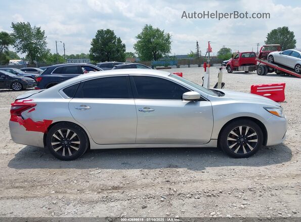 1N4AL3AP3JC198071 2018 NISSAN ALTIMA Silver Vista interior trasera