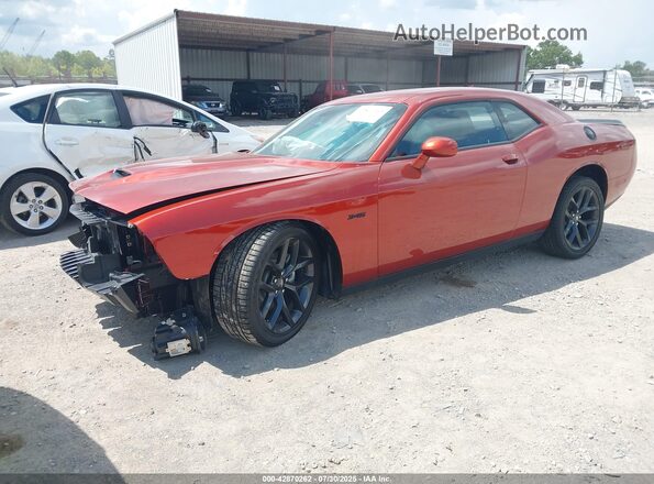 2C3CDZBTXPH521668 2023 DODGE CHALLENGER Orange Vista tres cuartos delantera izquierda