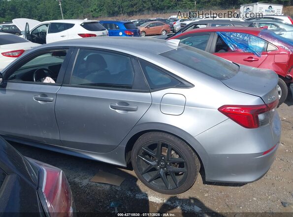 2HGFE2F59PH554025 2023 HONDA CIVIC Серебряный Вид задней части салона