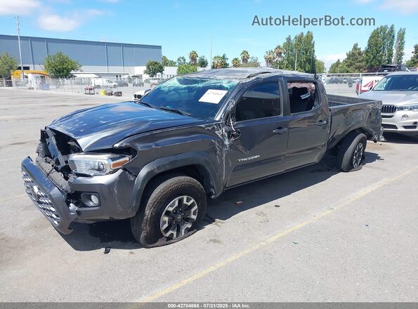 3TMDZ5BN5PM154398 2023 TOYOTA TACOMA Black Vista tres cuartos delantera izquierda
