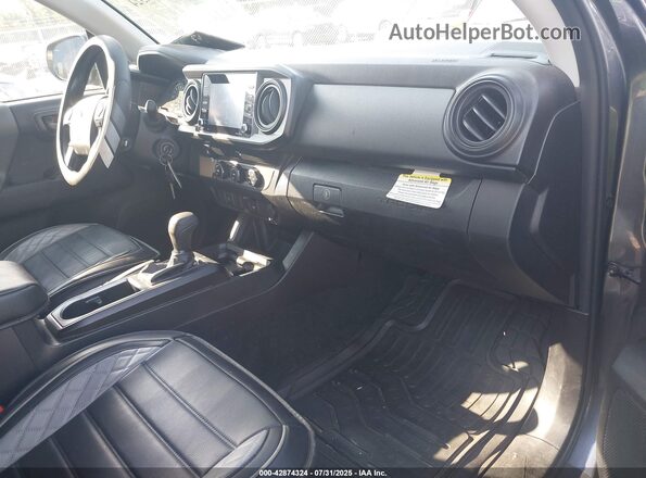 3TYRX5GN9PT084963 2023 TOYOTA TACOMA Gray Front interior view