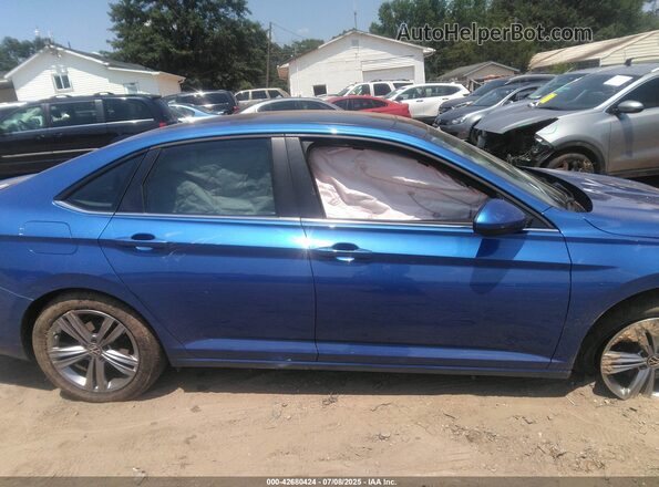3VW7M7BU7PM026367 2023 VOLKSWAGEN JETTA Blue Vista interior trasera