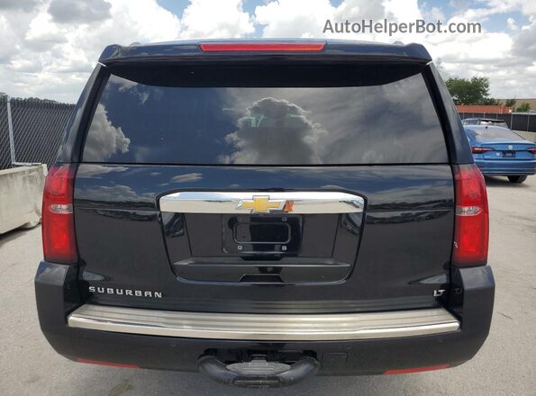 1GNSKHKC0LR158788 2020 CHEVROLET SUBURBAN Черный Вид салона спереди