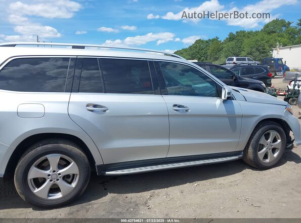 4JGDF6EE5HA893436 2017 MERCEDES-BENZ GLS 450 Silver Widok wnętrza z tyłu