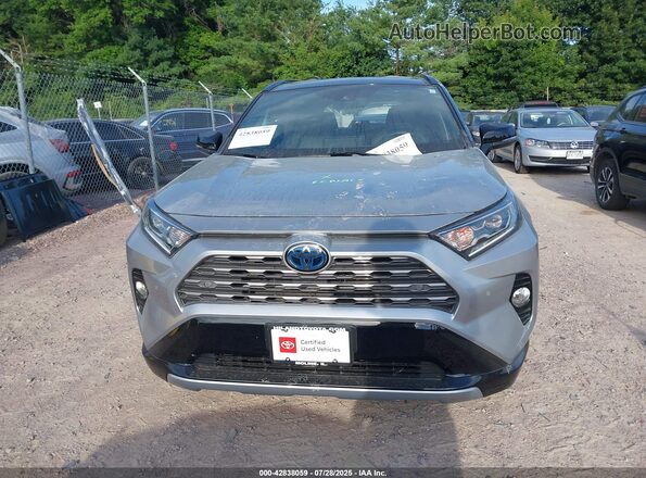 4T3E6RFV1LU001704 2020 TOYOTA RAV4 HYBRID Серебряный Вид задней части салона