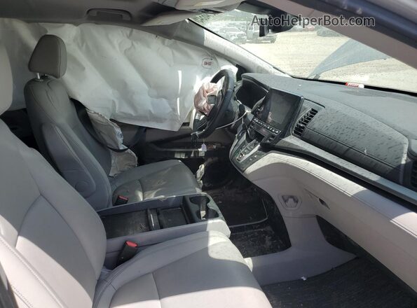 5FNRL6H63PB048629 2023 HONDA ODYSSEY Серебряный Вид салона спереди