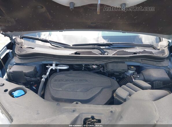 5FNYF8H53PB009724 2023 HONDA PASSPORT Gray Вид ззаду