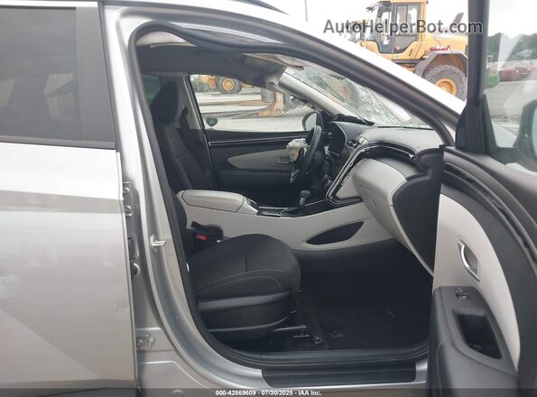 5NMJBCAE7PH217498 2023 HYUNDAI TUCSON Серебряный Вид салона спереди