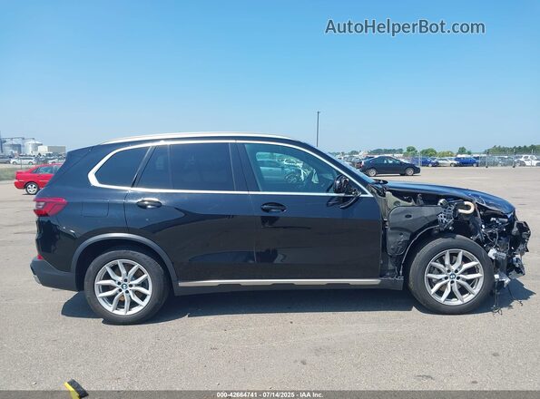 5UXCR6C04L9B94955 2020 BMW X5 Black Rear interior view