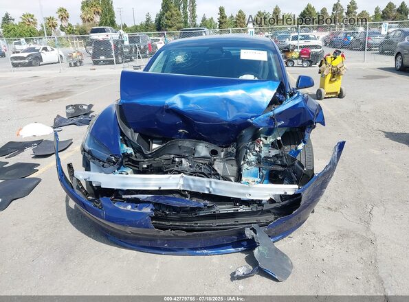 5YJ3E1EB9SF932149 2025 TESLA MODEL 3 Blue ხელსაწყოთა პანელის ხედი