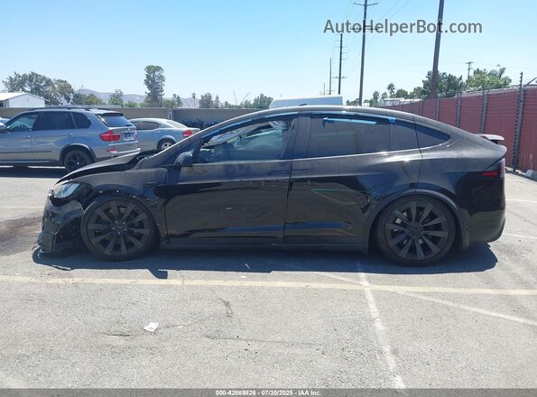 7SAXCAE50PF380634 2023 TESLA MODEL X Black Vista interior trasera