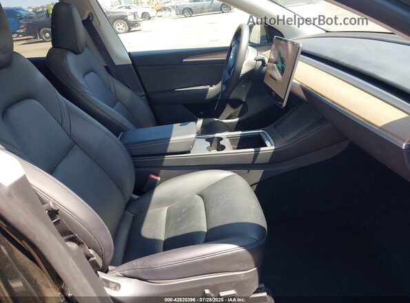 7SAYGAEE6PF904152 2023 TESLA MODEL Y Black Vista interior delantera