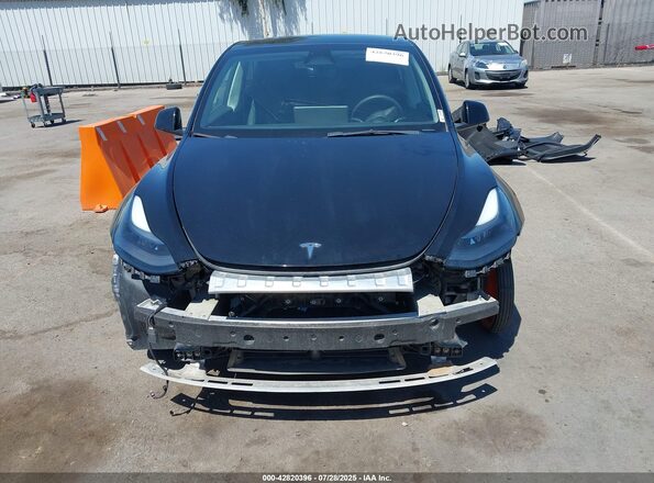 7SAYGAEE6PF904152 2023 TESLA MODEL Y Black Vista interior trasera