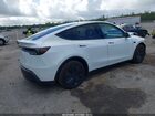 2026 Tesla Model Y Long Range Dual Motor All-wheel Drive White vin: 7SAYGDEDXTF378062
