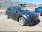 2024 Tesla Model Y Long Range Dual Motor All-wheel Drive Gray vin: 7SAYGDEE0RA285677