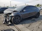 2025 Tesla Model Y Black vin: 7SAYGDEE1SF283655