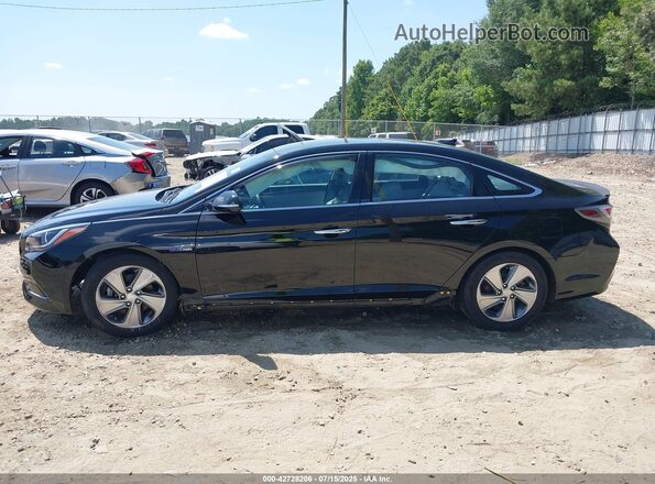 KMHE34L16GA008452 2016 HYUNDAI SONATA HYBRID Black 360 interior view