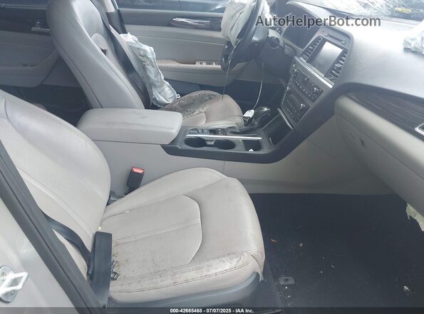 KMHE34L16GA020777 2016 HYUNDAI SONATA Silver Front interior view