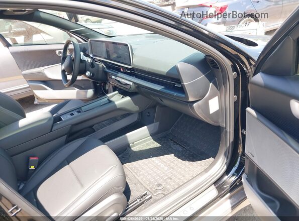 KMHM54AC9SA093905 2025 HYUNDAI IONIQ 6 Black წინა სალონის ხედი