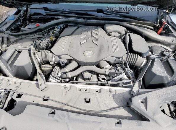 WBAFY4C07NCH97004 2022 BMW M8 Серый Вид задней части салона
