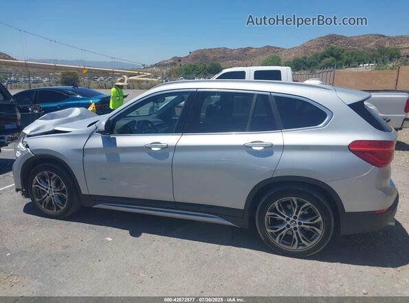 WBXHT3C37H5F87304 2017 BMW X1 Серебряный 