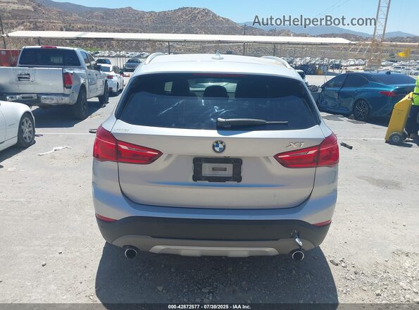 WBXHT3C37H5F87304 2017 BMW X1 Серебряный 