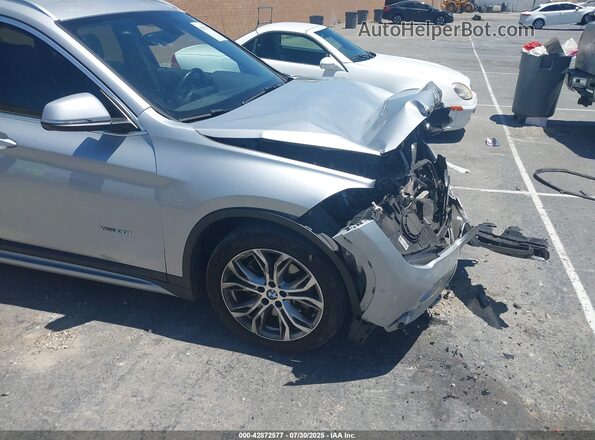 WBXHT3C37H5F87304 2017 BMW X1 Серебряный 