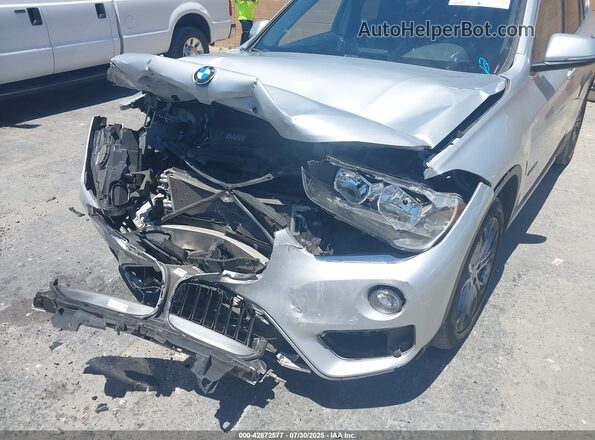 WBXHT3C37H5F87304 2017 BMW X1 Серебряный 