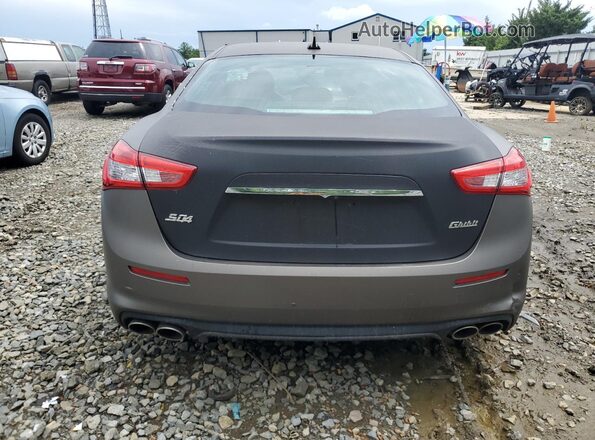 ZAM57YTA6K1324972 2019 MASERATI GHIBLI Серый Вид сзади