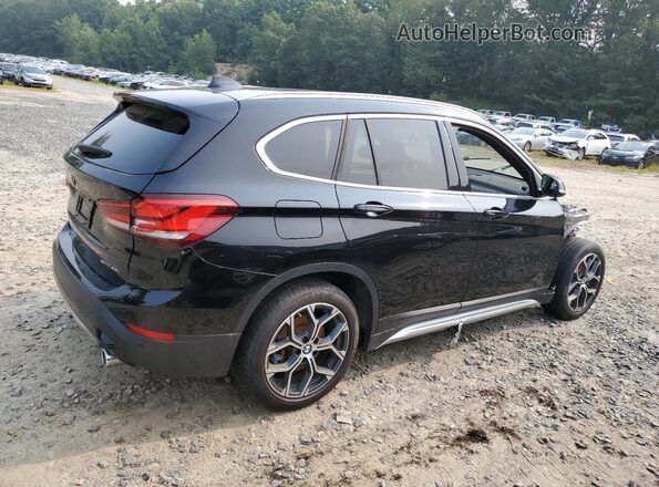 WBXJG7C04M5S29555 2021 BMW X1 Черный Передняя правая четверть