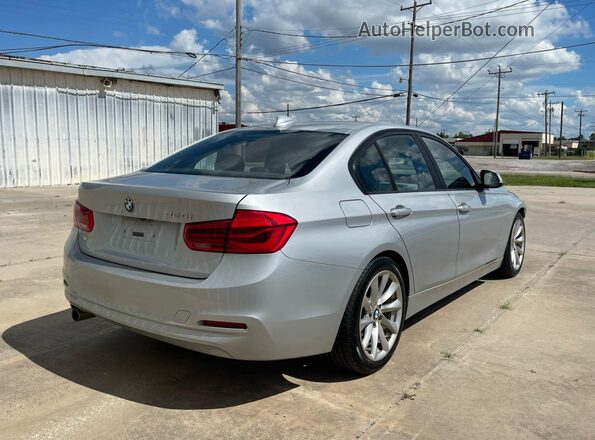 WBA8E1G59JNU89642 2018 BMW OTHER Серебряный Вид спереди
