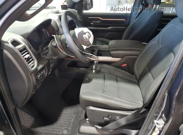 1C6SRFFP7SN668588 2025 RAM 1500 Серый Вид салона спереди