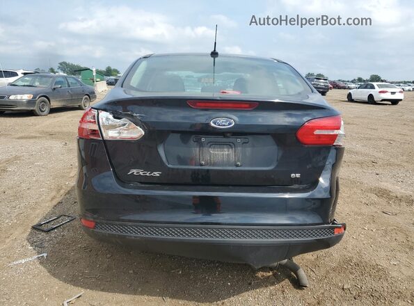 1FADP3F20JL270326 2018 FORD FOCUS Black Вид ззаду