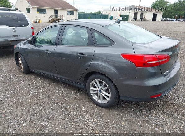 1FADP3F29JL279784 2018 FORD FOCUS Gray Rear left