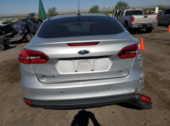 1FADP3H24JL223605 2018 FORD FOCUS Silver Rear view