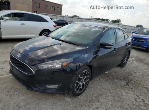 1FADP3H25JL223385 2018 FORD FOCUS Black წინა მარცხენა ხედი სამი მეოთხედიდან