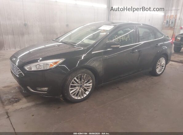 1FADP3J23JL312723 2018 FORD FOCUS Black Przód lewy