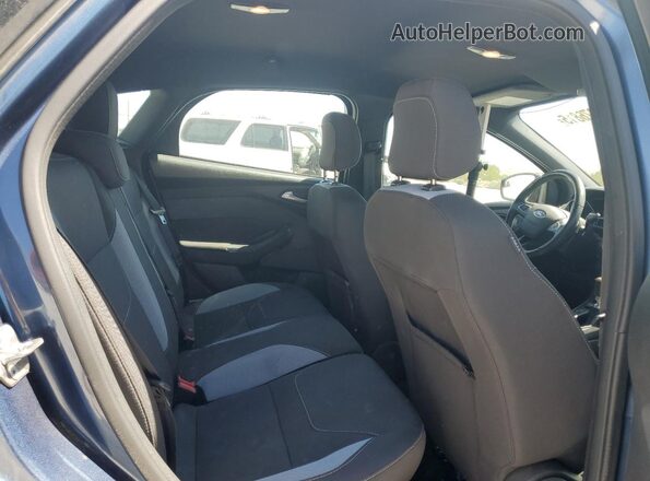 1FADP3L99JL293590 2018 FORD FOCUS Blue Vista de los asientos traseros