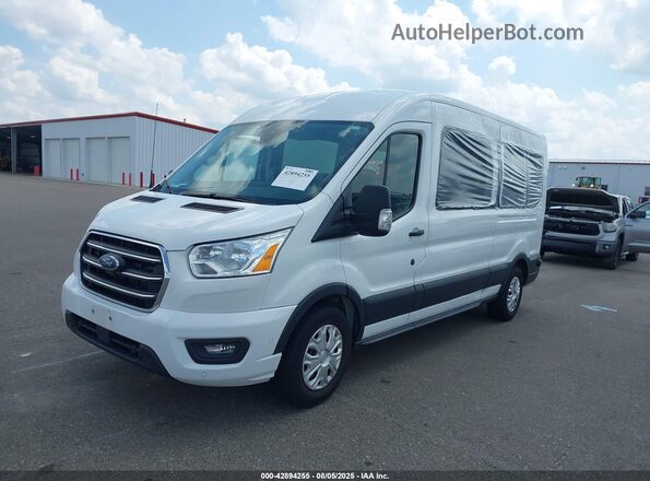 1FBAX2C80LKA43280 2020 FORD PASSENGER Белый Передняя левая четверть