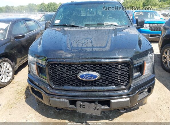 1FTEW1EG3JFD65982 2018 FORD F150 Черный Вид задней части салона