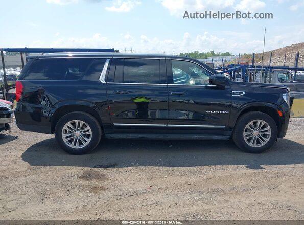 1GKS2GKDXPR543801 2023 GMC YUKON Black Widok wnętrza z tyłu