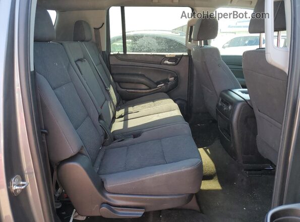 1GNSCGKC1JR194249 2018 CHEVROLET SUBURBAN Silver Սալոնի հետևի տեսք