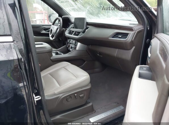 1GNSCNKD7MR213341 2021 CHEVROLET TAHOE Черный Вид салона спереди