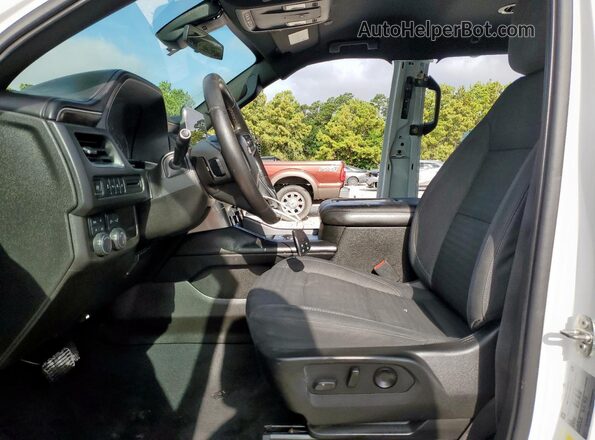 1GNSKBKD9MR259044 2021 CHEVROLET SUBURBAN Белый Вид салона спереди