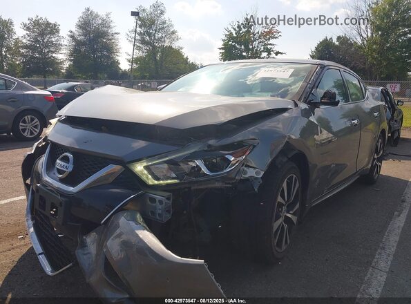 1N4AA6AP2JC406125 2018 NISSAN MAXIMA Gray Vista tres cuartos delantera izquierda