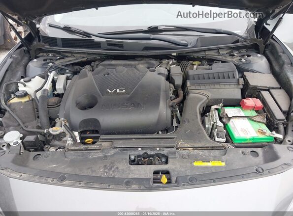 1N4AA6AP3JC394812 2018 NISSAN MAXIMA Серый Вид сзади