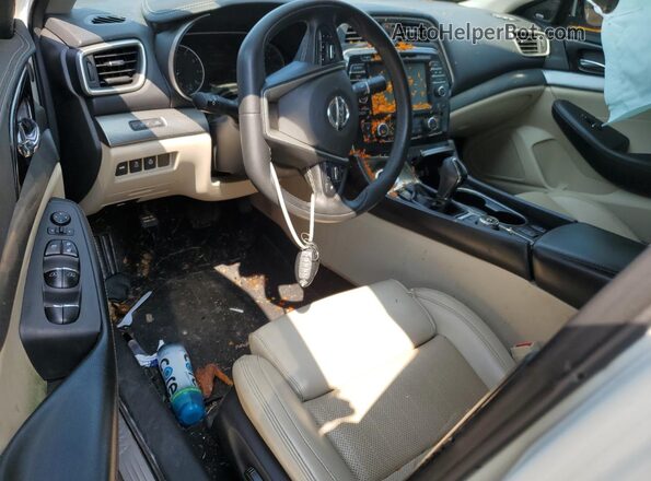 1N4AA6APXJC401657 2018 NISSAN MAXIMA Белый Вид панели приборов