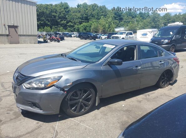 1N4AL3AP4JC201124 2018 NISSAN ALTIMA Gray Vista tres cuartos delantera izquierda